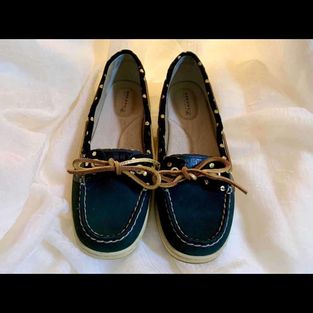 Sperry Angelfish black and gold top-sider boat shoes.